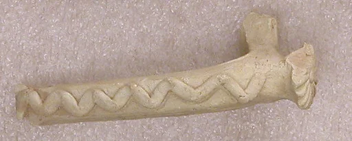 Fragment of a Handle with Wavy Band and Rosette-Shaped Thumb Rest