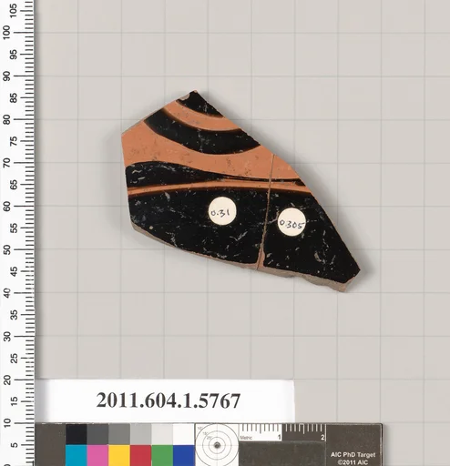 Terracotta fragment of a kylix: eye-cup (drinking cup)