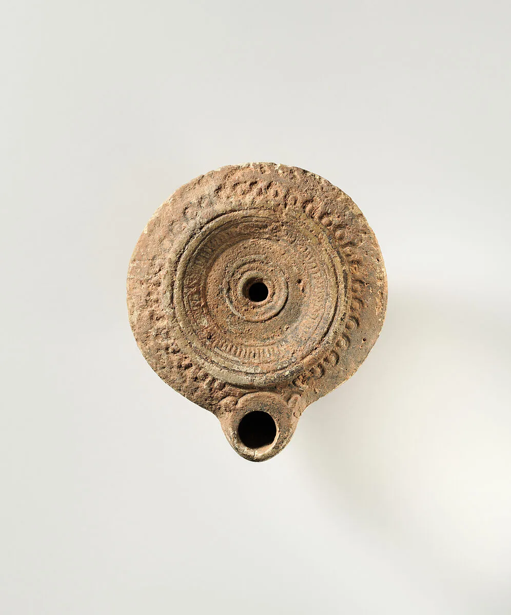 Terracotta oil lamp — Unknown