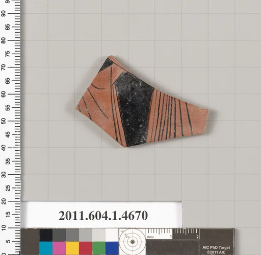 Terracotta fragment of a kylix (drinking cup)