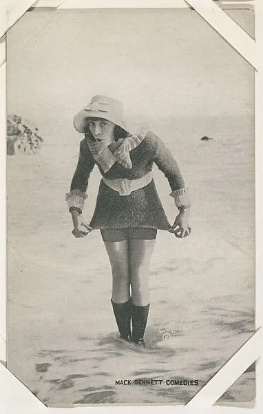 Bathing beauty in costume standing in water from Mack Sennett Comedies Arcade series (W423) — Unknown