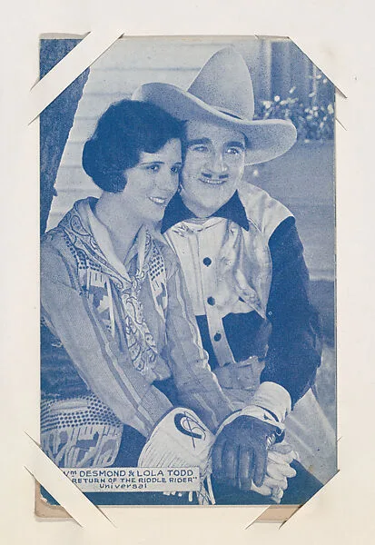 Wm. Desmond & Lola Todd in "Return of the Riddle Rider" from Western Stars or Scenes Exhibit Cards series (W412) — Unknown