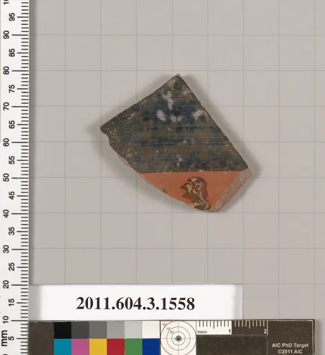 Terracotta fragment of a kylix: Band cup (drinking cup)