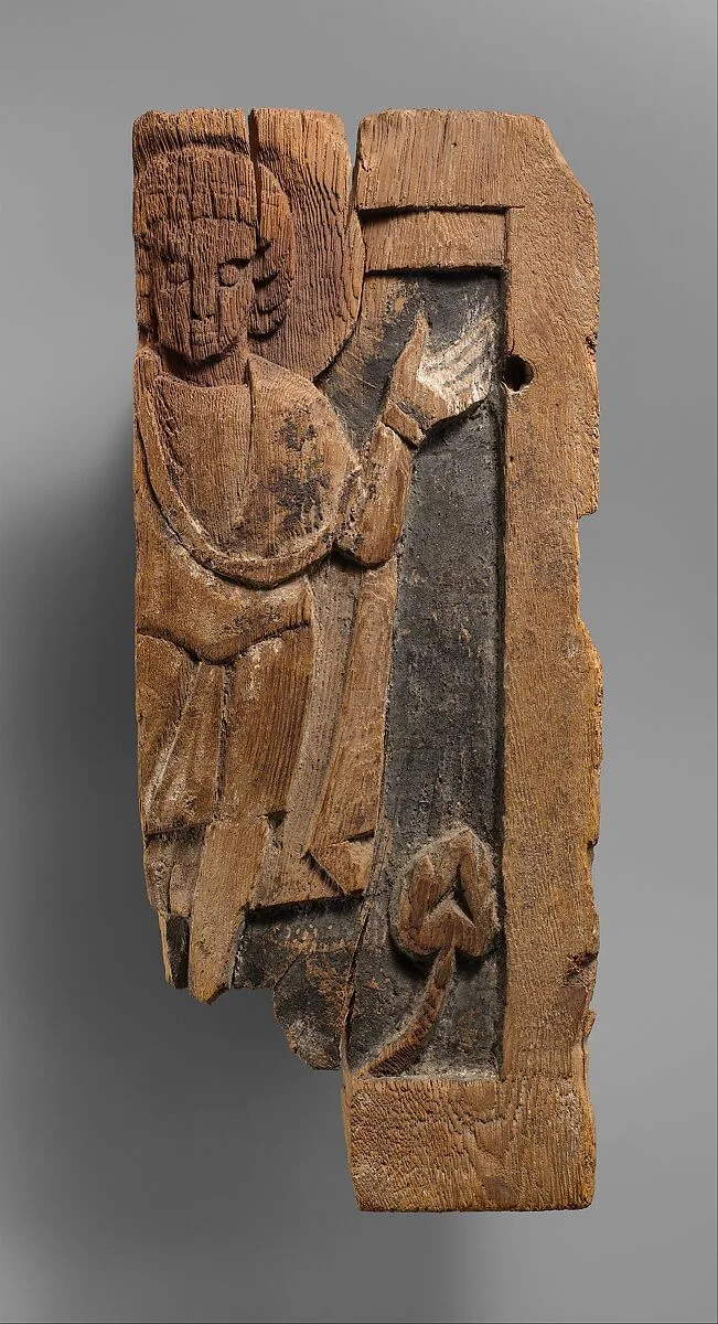 Fragmentary Carved Panel with a Saint — Unknown