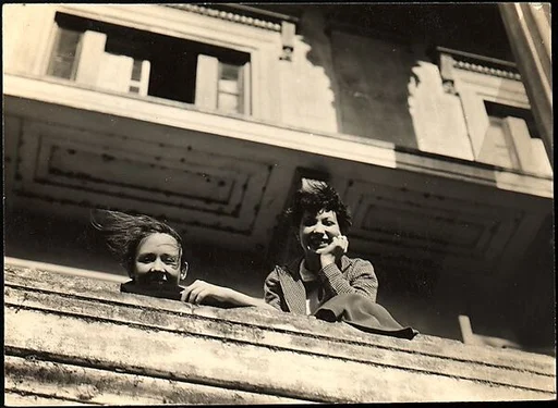 [Jane Ninas and Christine Fairchild on Balcony, Belle Grove Plantation House, White Castle, Louisiana]