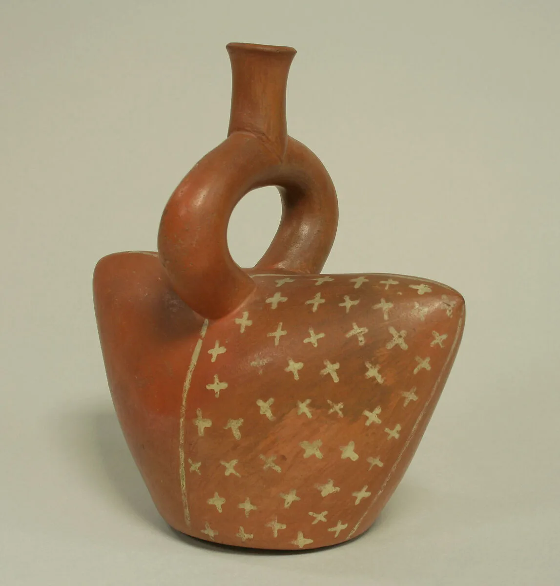 Stirrup spout bottle in cap shape — Unknown