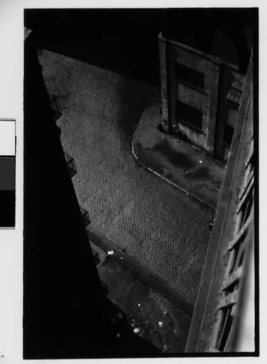 [Three 35mm Film Frames: View from Window of Corner Buildings and Cobblestone Street, Brooklyn?, New York]