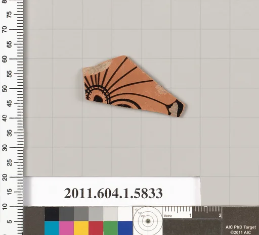 Terracotta fragment of a kylix: eye-cup (drinking cup)
