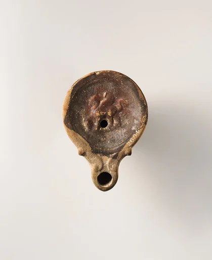 Terracotta oil lamp