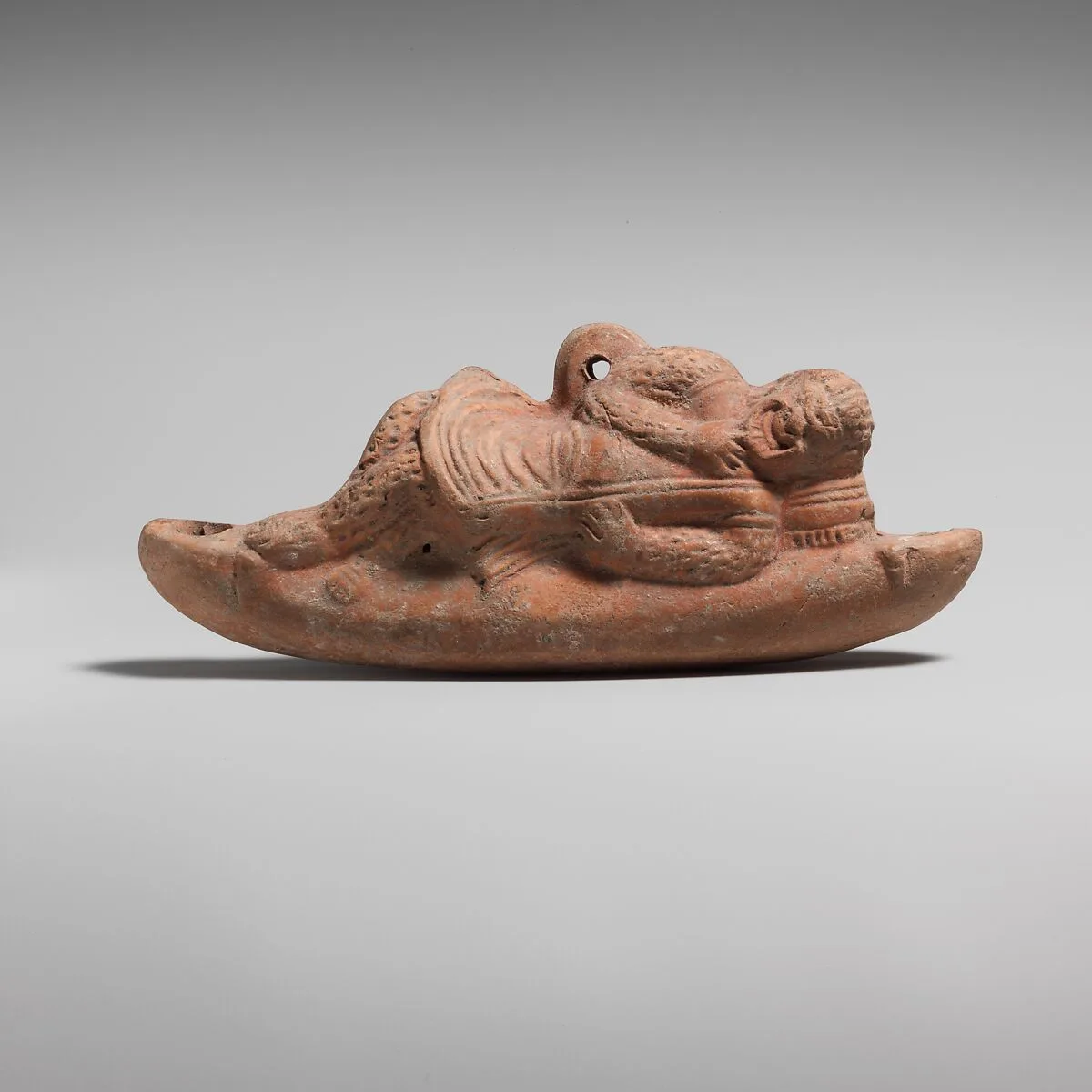 Terracotta hanging lamp in the form of a comic actor — Unknown