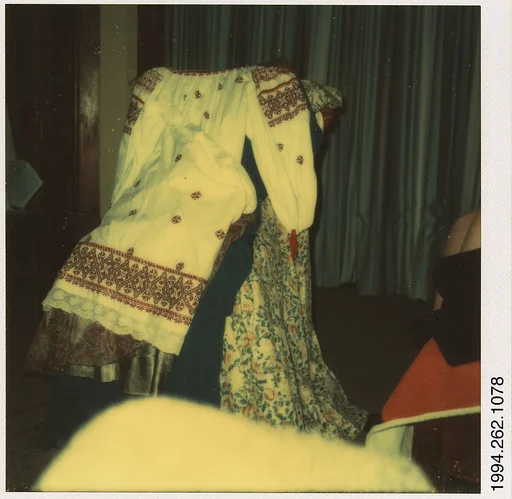 [Print Dress Draped on Armchair]