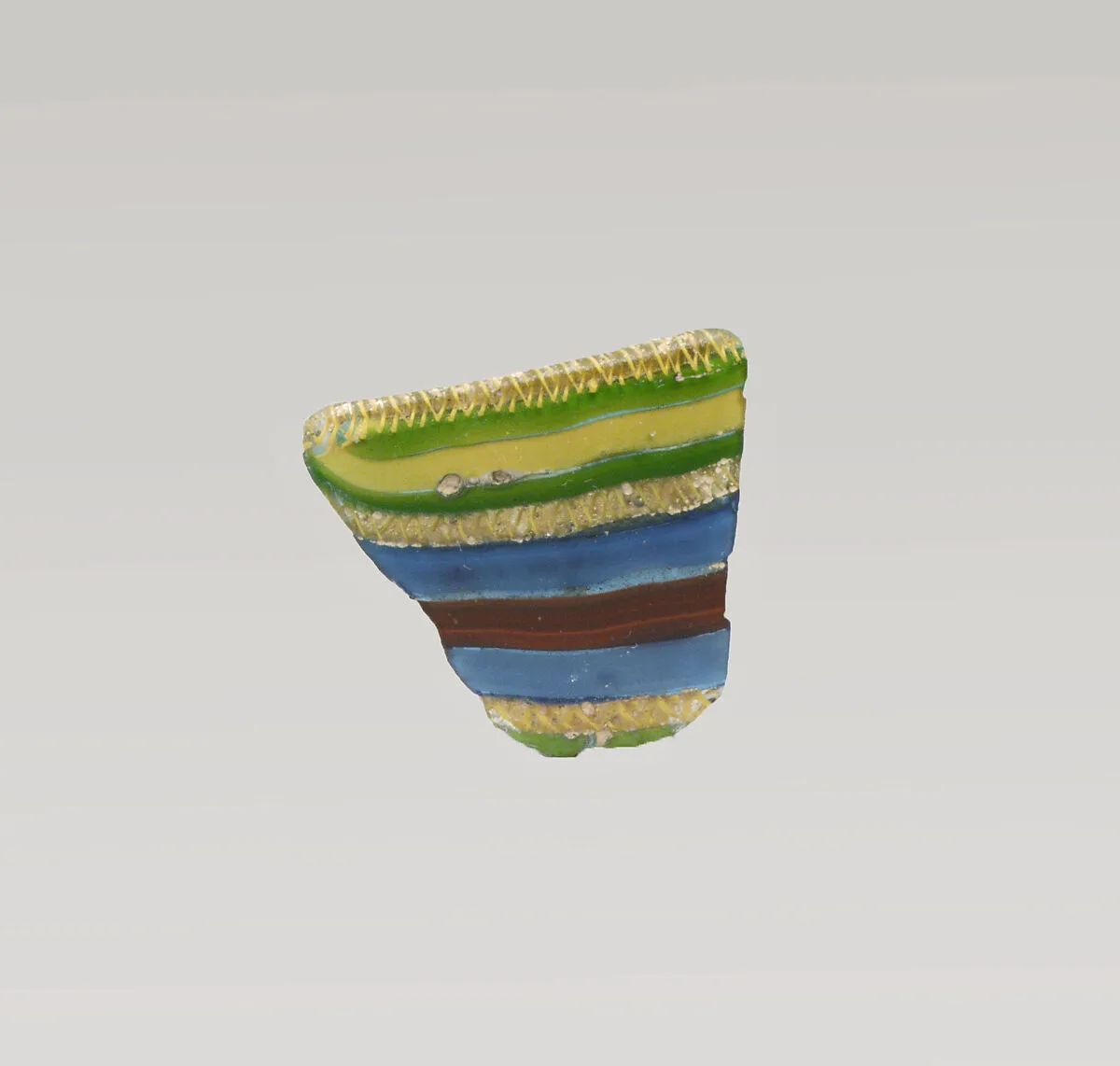 Glass striped mosaic bowl fragment — Unknown