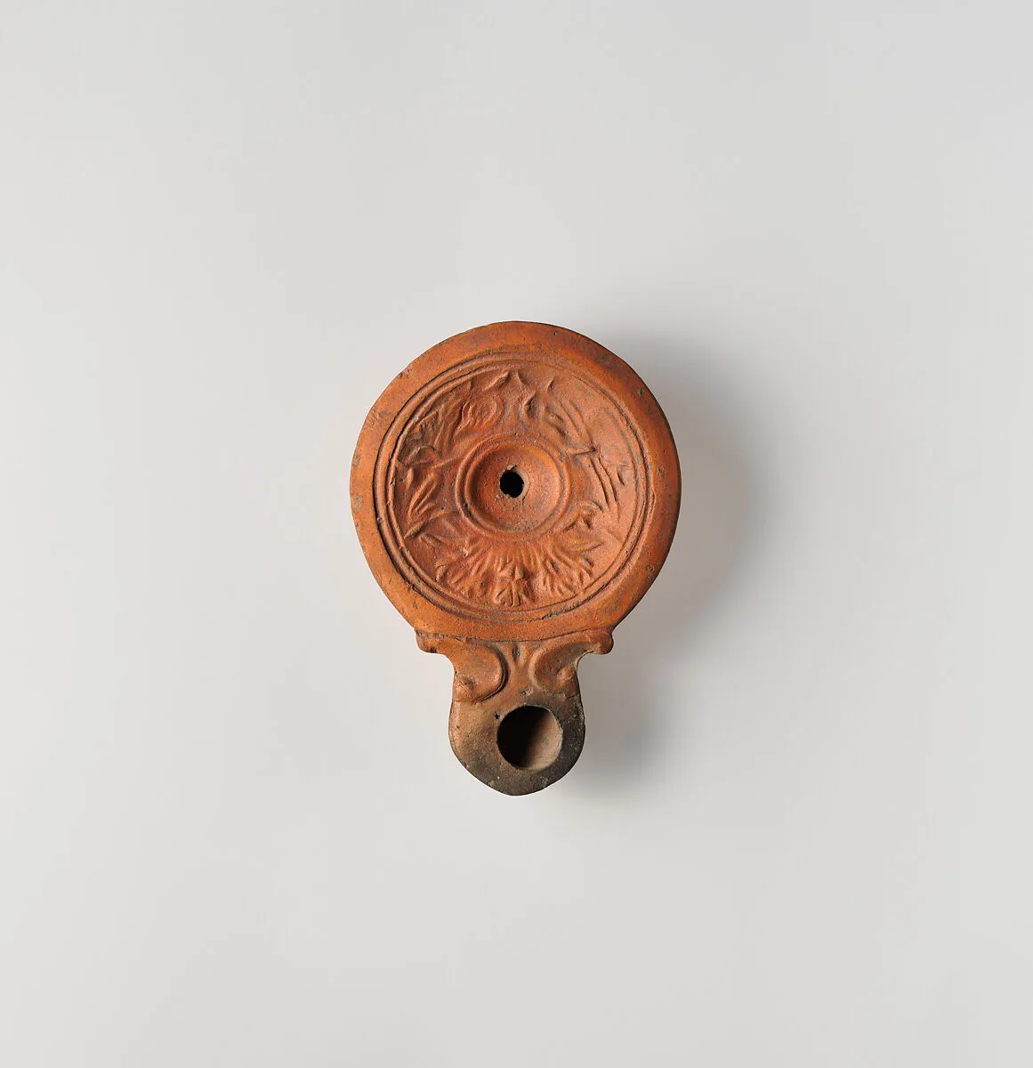 Terracotta oil lamp — Unknown