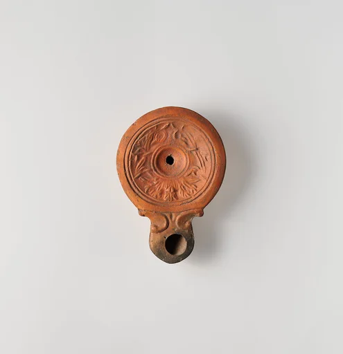 Terracotta oil lamp
