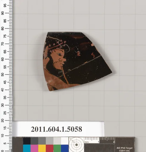 Terracotta fragment of a kylix (drinking cup)