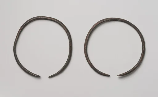 A pair of bracelets or anklets