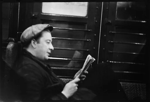 [Five 35mm Film Frames: Subway Passengers, New York City: Man in Cap Reading Newspaper, Two Young Women]