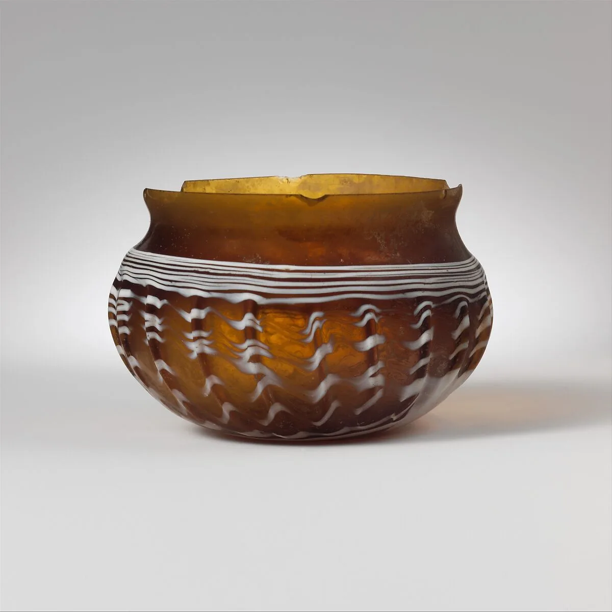 Glass ribbed bowl — Unknown