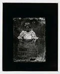 Woman outdoors – Ewe kente skirt, headtie and blouse