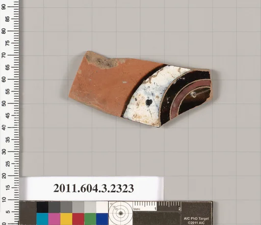 Terracotta fragment of a kylix: eye-cup (drinking cup)