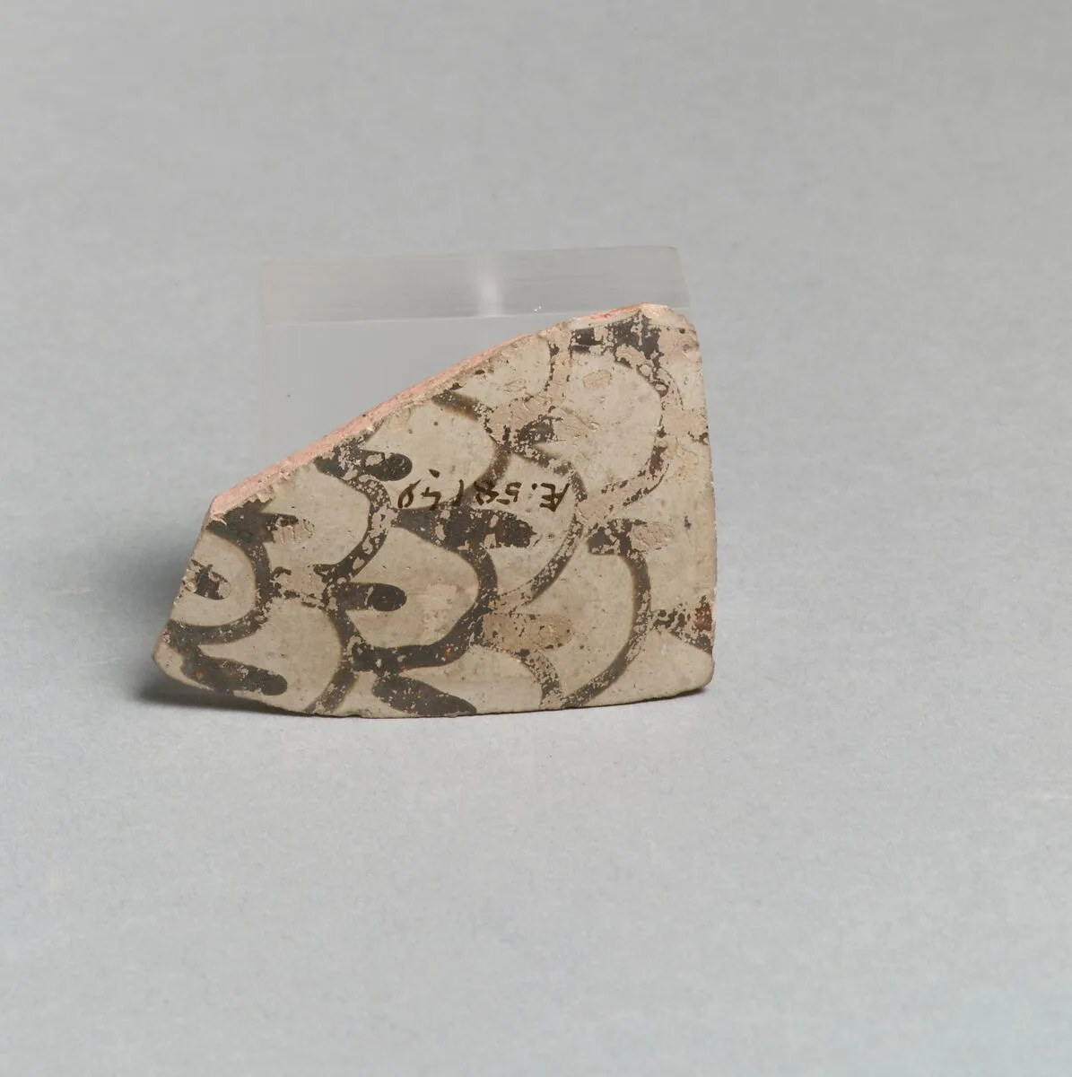 Terracotta vessel fragment with scale pattern — Unknown