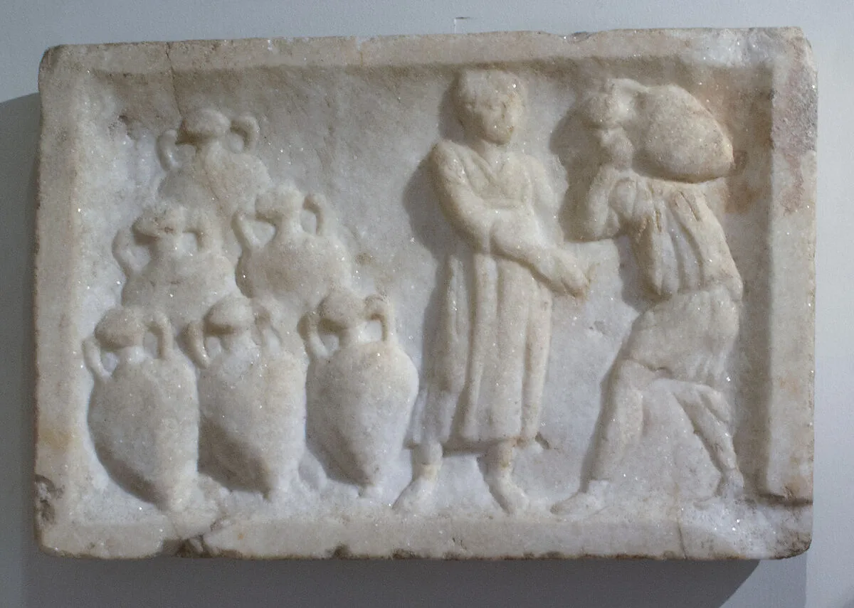 Marble relief showing transport amphorae — Unknown