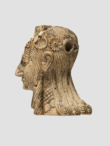 Head of a female figure