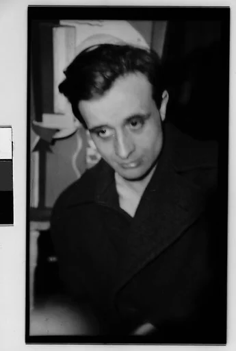 [Hanns Skolle in Overcoat]