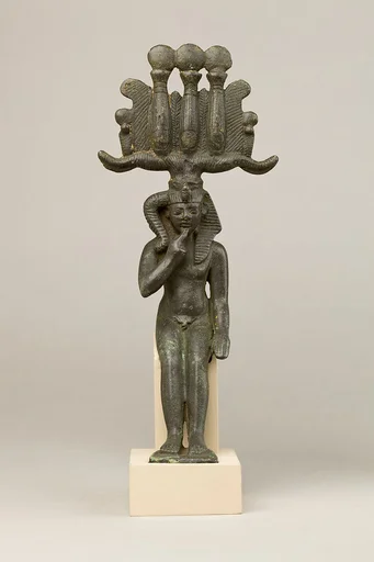 Child god in nemes and hemhem crown