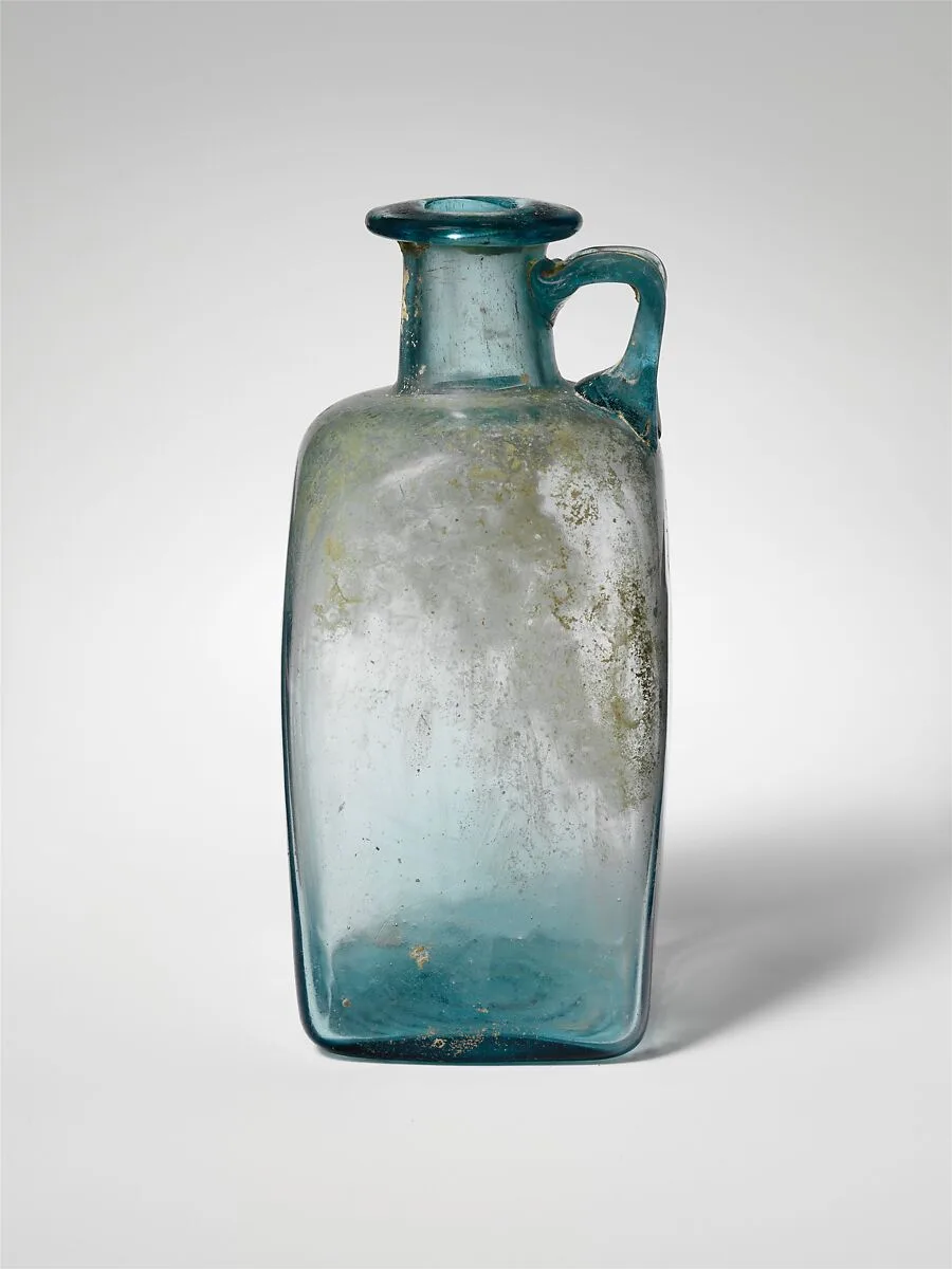 Glass square bottle — Unknown