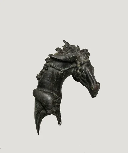 Two fulcra (headrest) attachments in the form of mule's heads