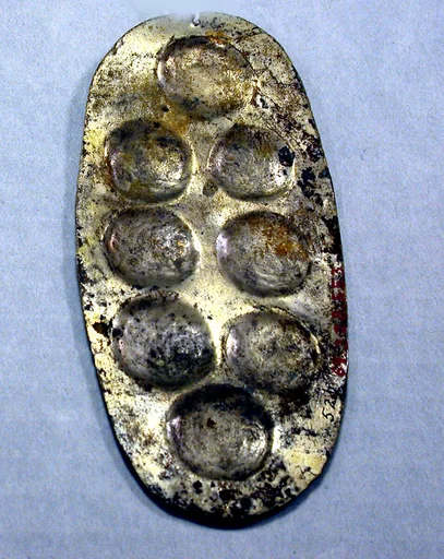 Hammered Silver Ornament with Repoussé Disks