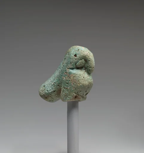 Figurine of a crouching falcon