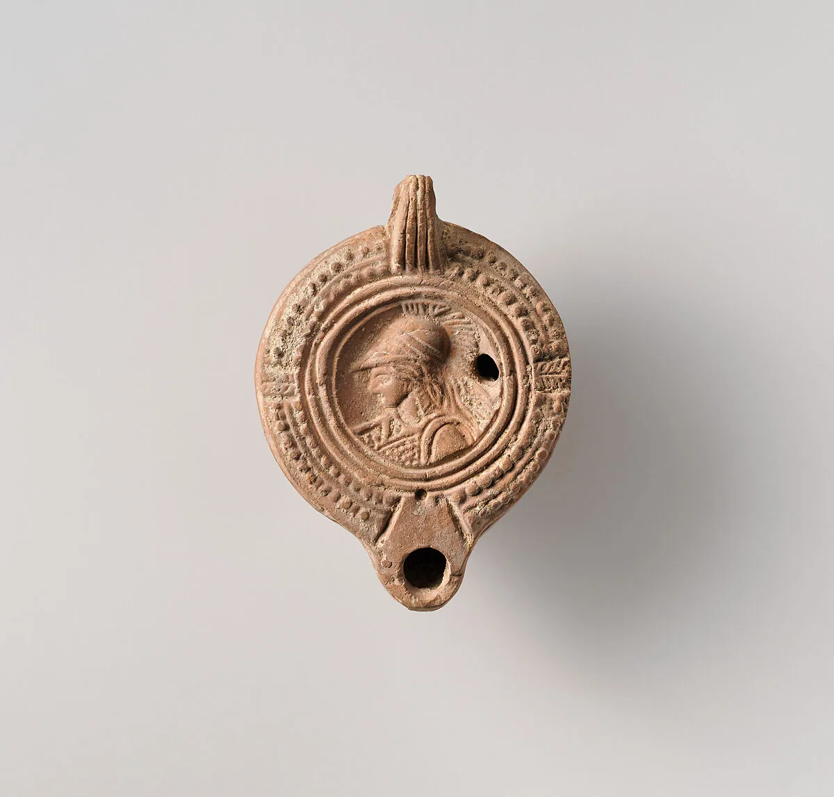 Terracotta oil lamp — Unknown