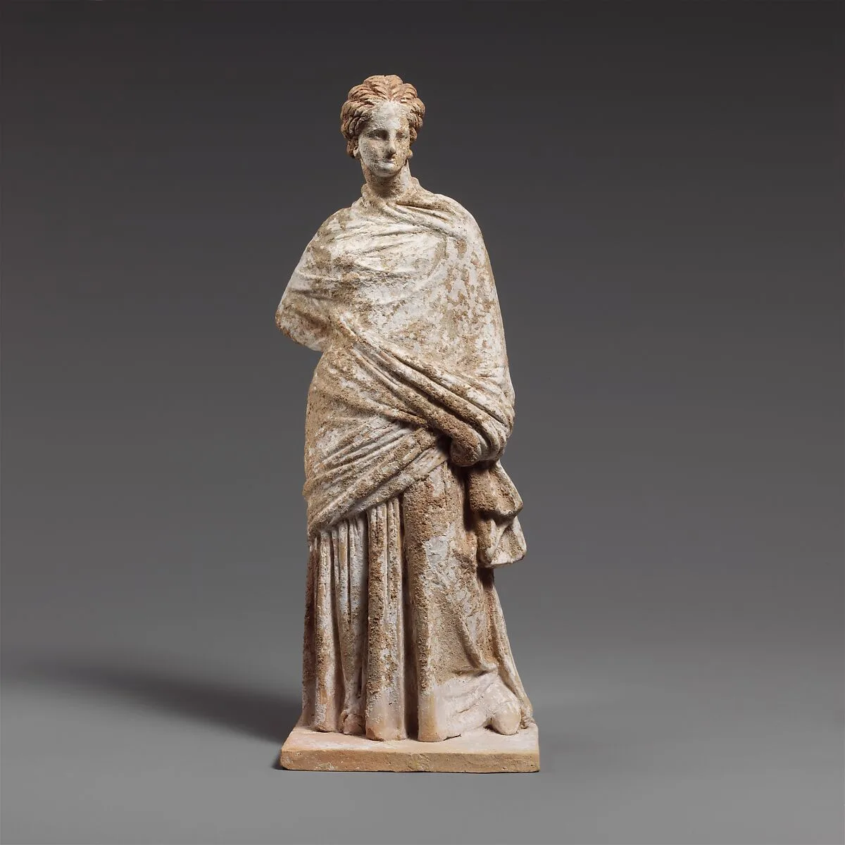 Terracotta statuette of a draped woman — Unknown