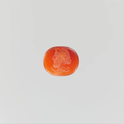Carnelian ring stone with Asclepius, the god of medicine