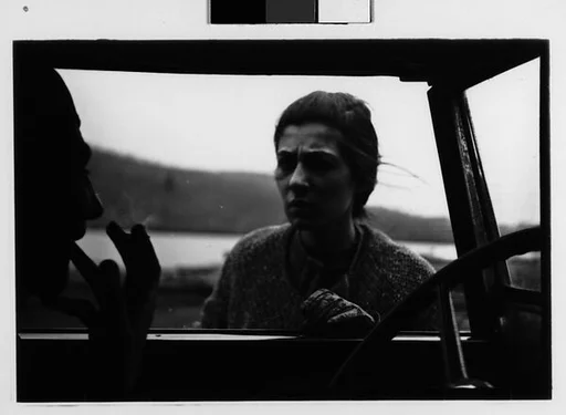 [Three 35mm Film Frames: Beatrice Jacoby Talking to Man Through Window of Parked Car, Probably Vicinity Millerton, New York]
