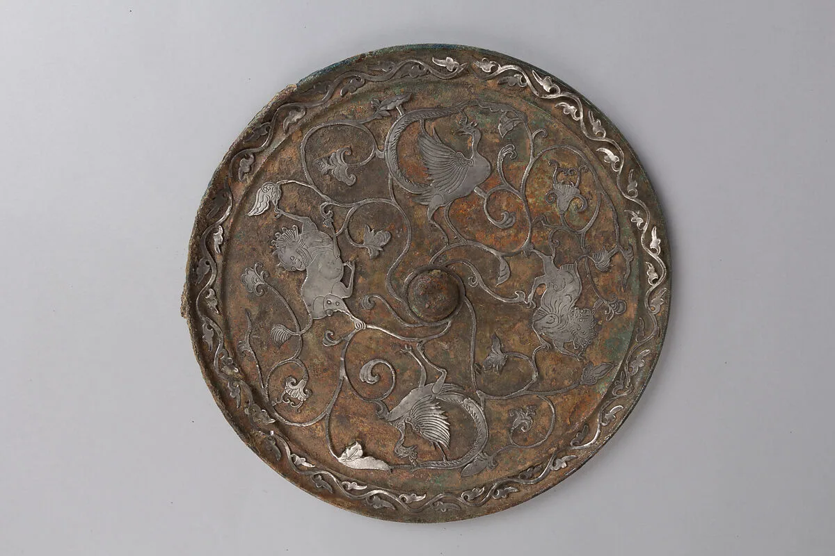唐 嵌銀鵉鳥狮紋銅鏡|Mirror with birds and lions — Unknown