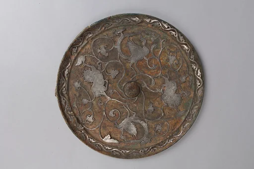 唐 嵌銀鵉鳥狮紋銅鏡|Mirror with birds and lions