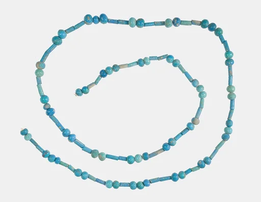 String of blue faience ball and cylinder beads