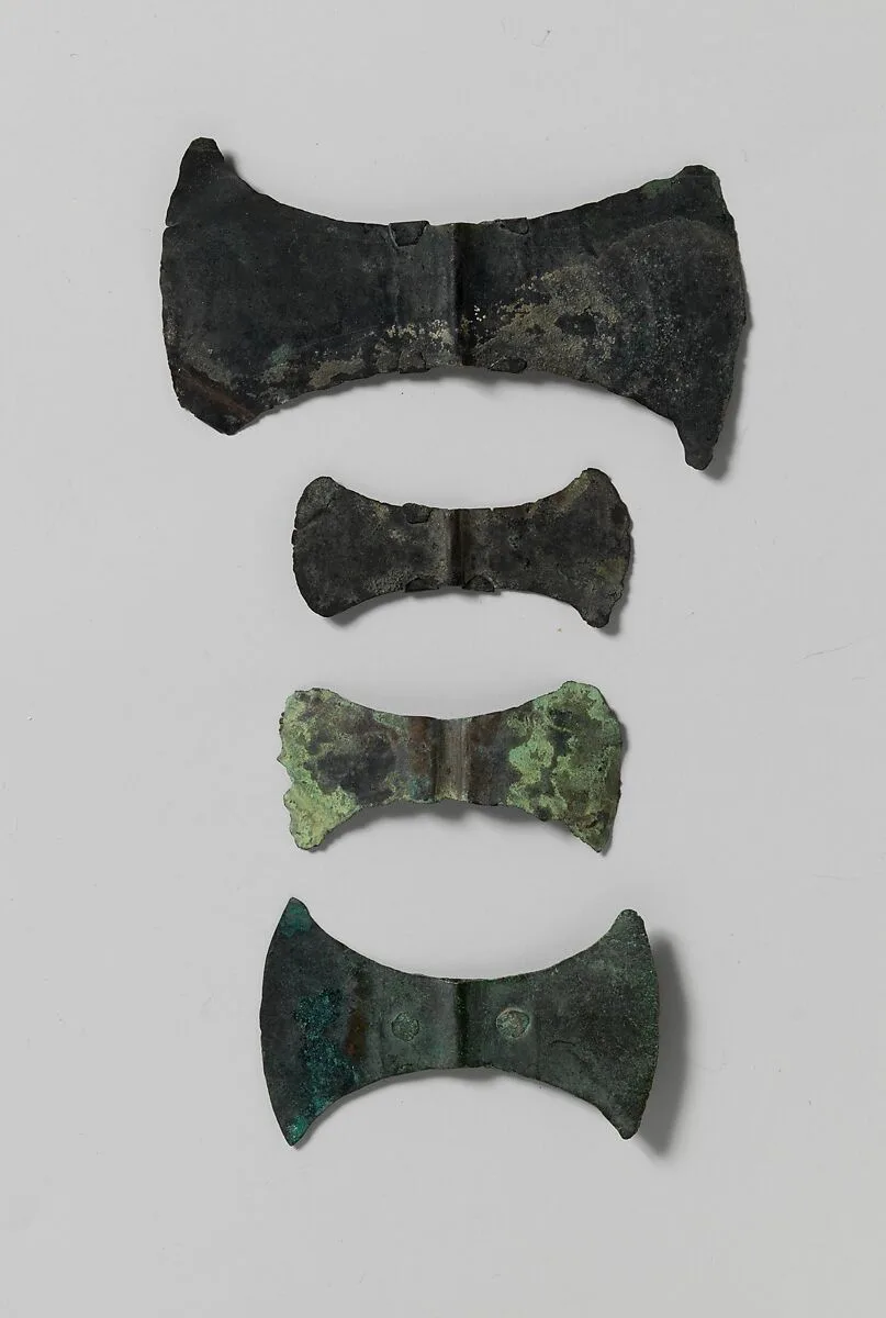 Bronze double-ax head — Unknown