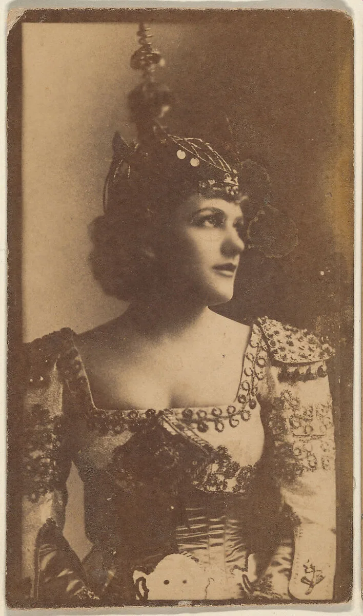 Actress wearing costume with pointed hat, from the Actresses series (N668) — Unknown