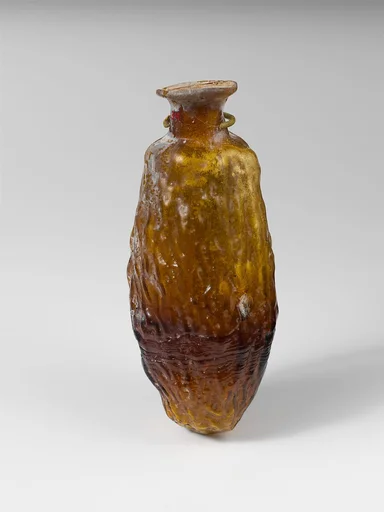 Glass bottle shaped like a date