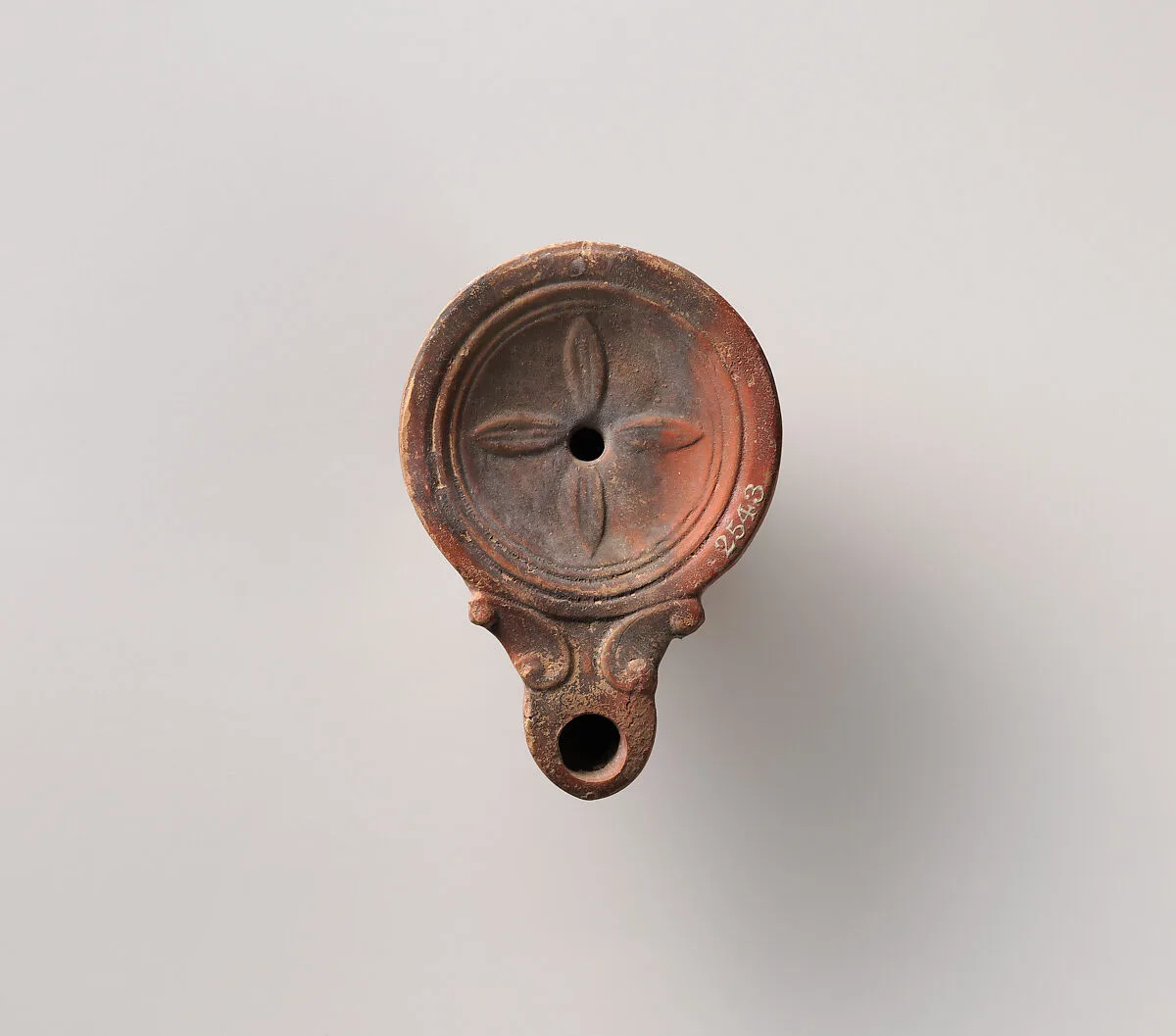 Terracotta oil lamp — Unknown