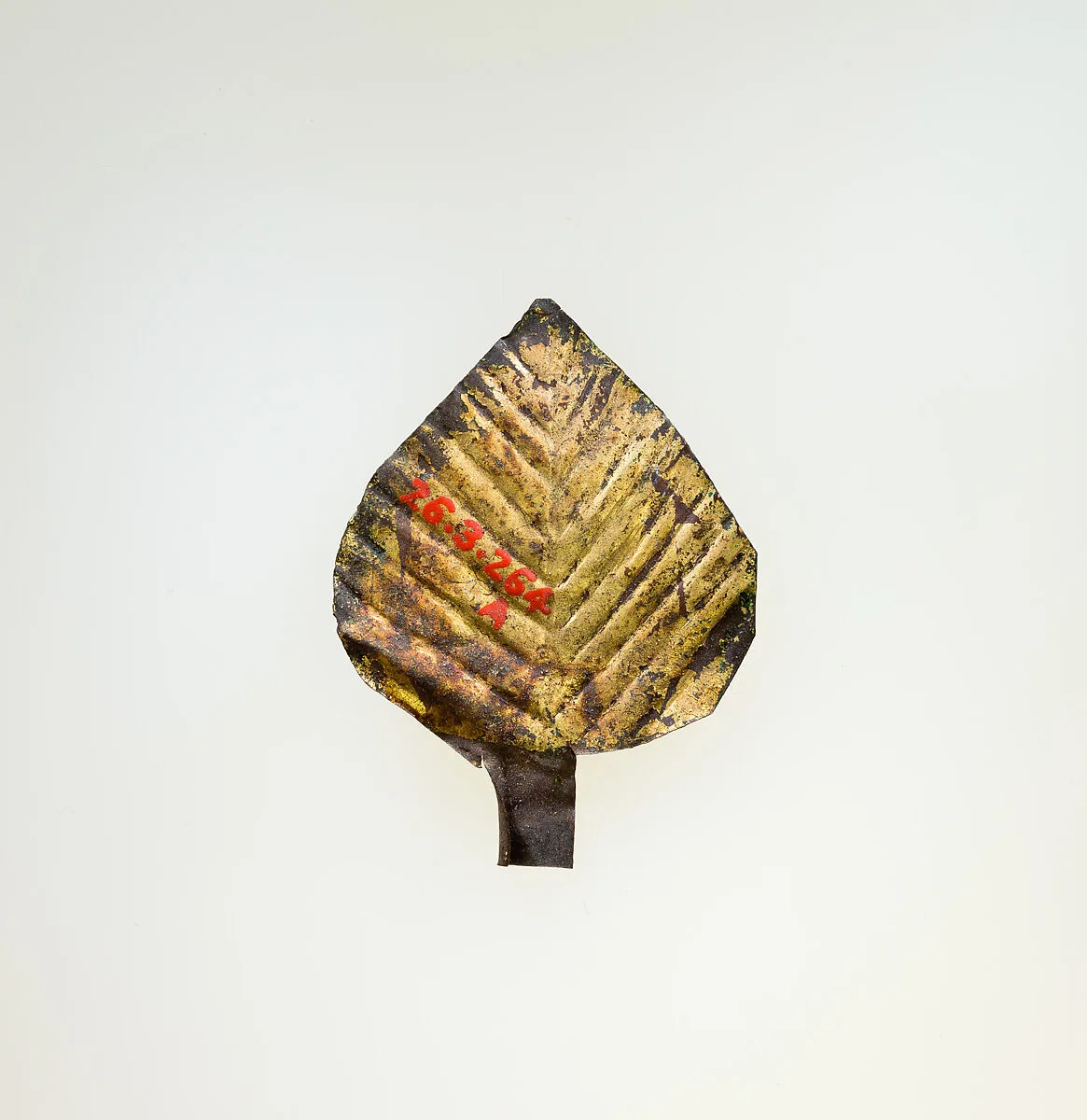 Three gilded leaves from a wreath — Unknown