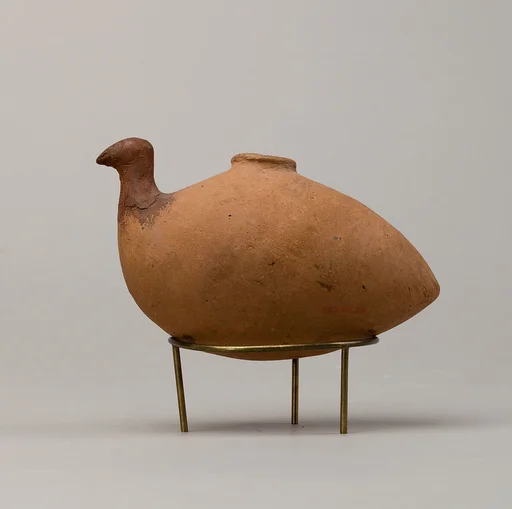 Vessel in shape of bird