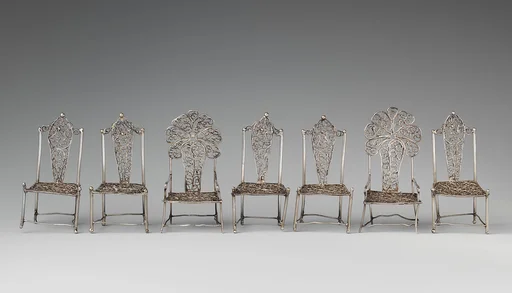 Set of seven miniature chairs