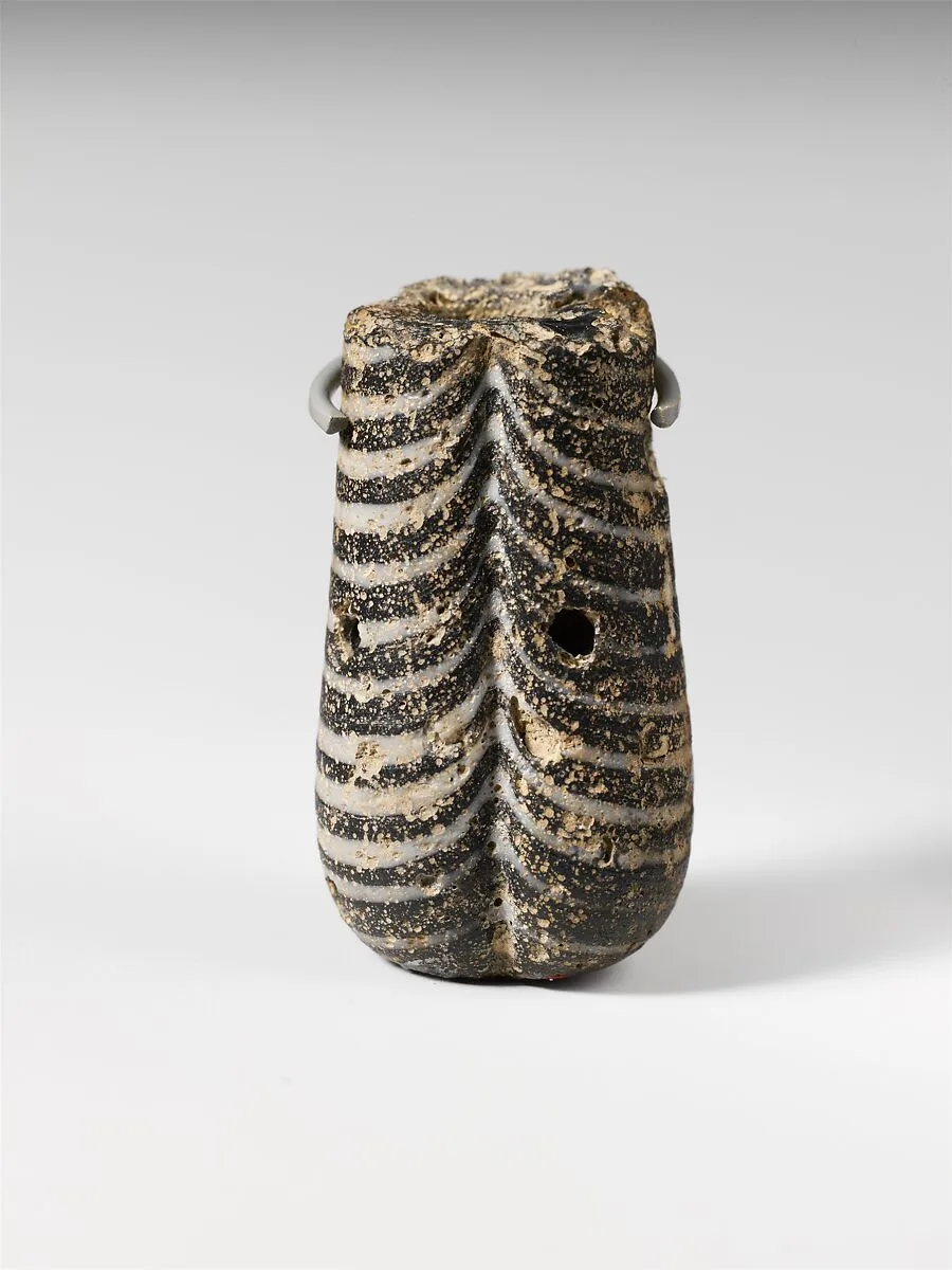 Glass pendant bead in the shape of a plumbline — Unknown