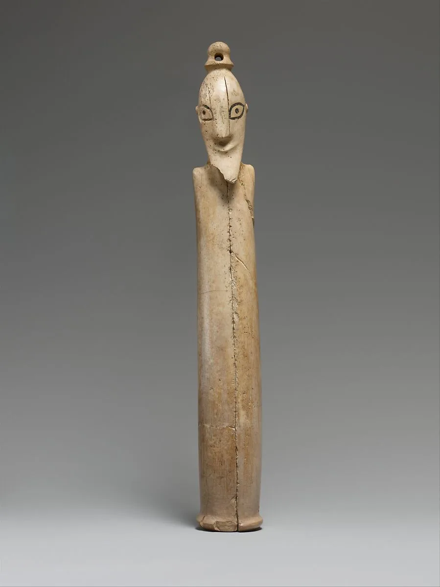 A Tusk Figurine of a Man — Unknown