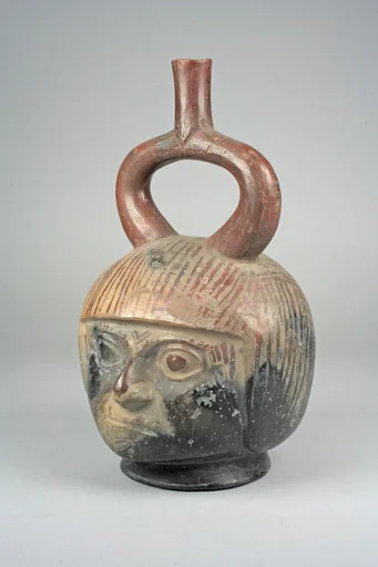 Stirrup Spout Bottle with Portrait Head